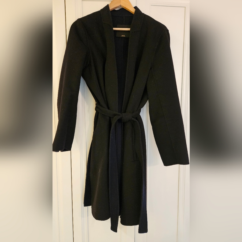 Ladies black coat . Navy blue inside . Very good condition .